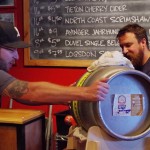 Tacoma-Beer-Week-2015-Justin-Peterson-taps-the-Ballast-Point-Firkin-at-The-Red-Hot